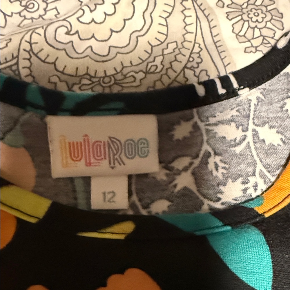 LuLaRoe Kids Dress with Vibrant Orange and Teal Patterns - Picture 2 of 3